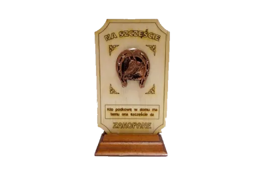 Podkowa na szczęście na podstawce frezowanej. Podkowa na szczęście na podstawce frezowanej.